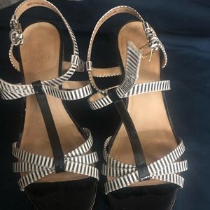 Used Kate Spade wedges. Super cute and goes great with everything.